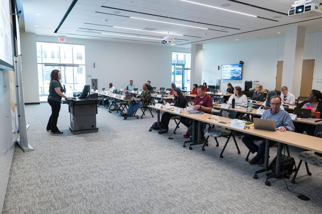 A Bootcamp in 2023 gathers in the Atkins Room at the NextGen Precision Health building
