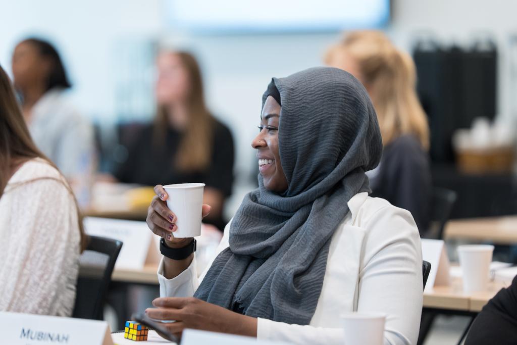 An attendee at a past Bootcamp engages in a lively discussion
