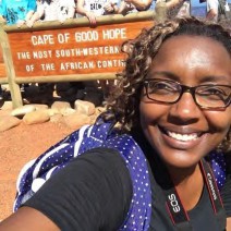 Standing in front of the Cape of Good Hope sign