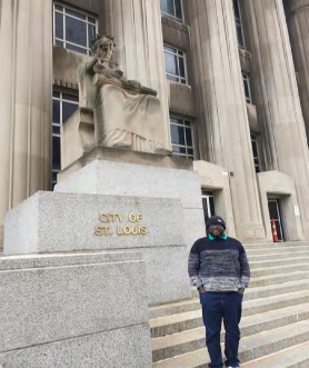 Posting in front of the City of St. Louis statue