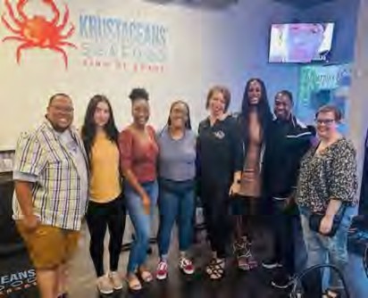 Dr. Landor and her Research Team with Dr. Makhetha dinning at a downtown restaurant