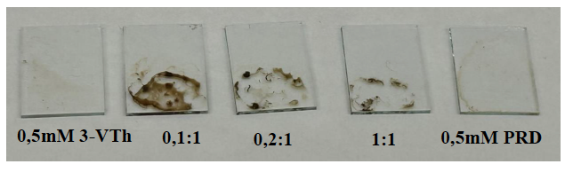 Several pieces of paper with stains.