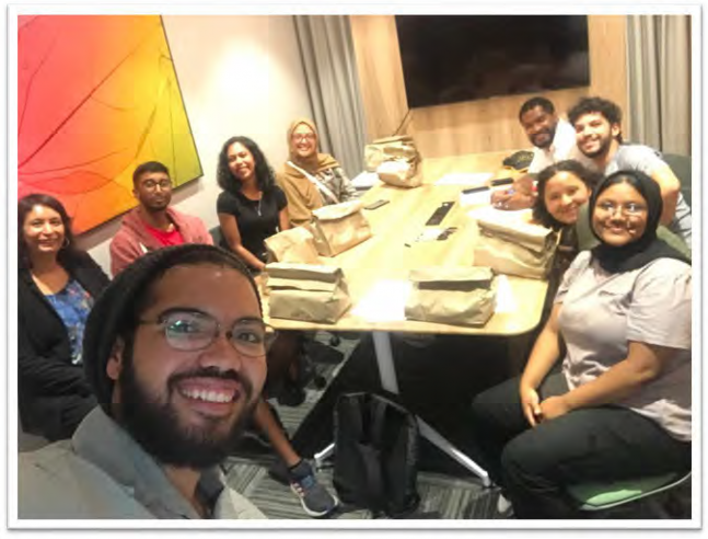 Drs. Melanie Luckay and Jason Vasser-Elong with students after a group interview.