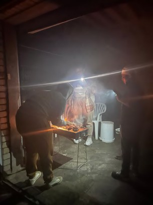 Braai evening, with individuals enjoying it