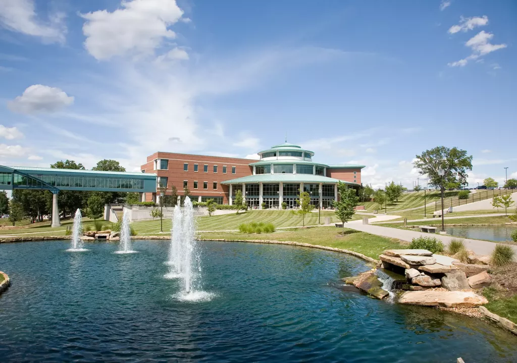 View of UMSL campus, lake and fountains
