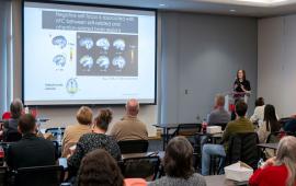 Dr. Carissa Philippi speaks to a crowd at the Discovery Series event at the Millennium Student Center on November 18, 2025.