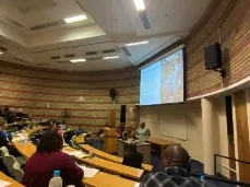 VR animated documentary presentation in an auditorium. 