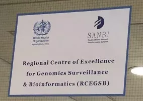Sign on a glass window for the Regional Centre of Excellence for Genomics Surveillance and Bioinformatics