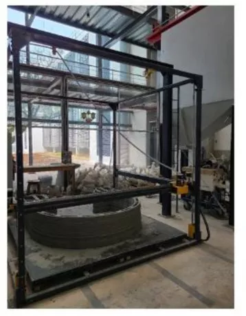 A concrete 3-D printer