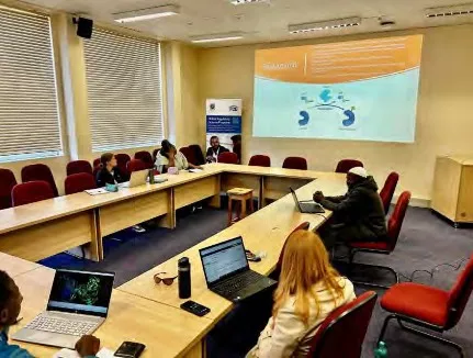 Participating in a group meeting in a conference room