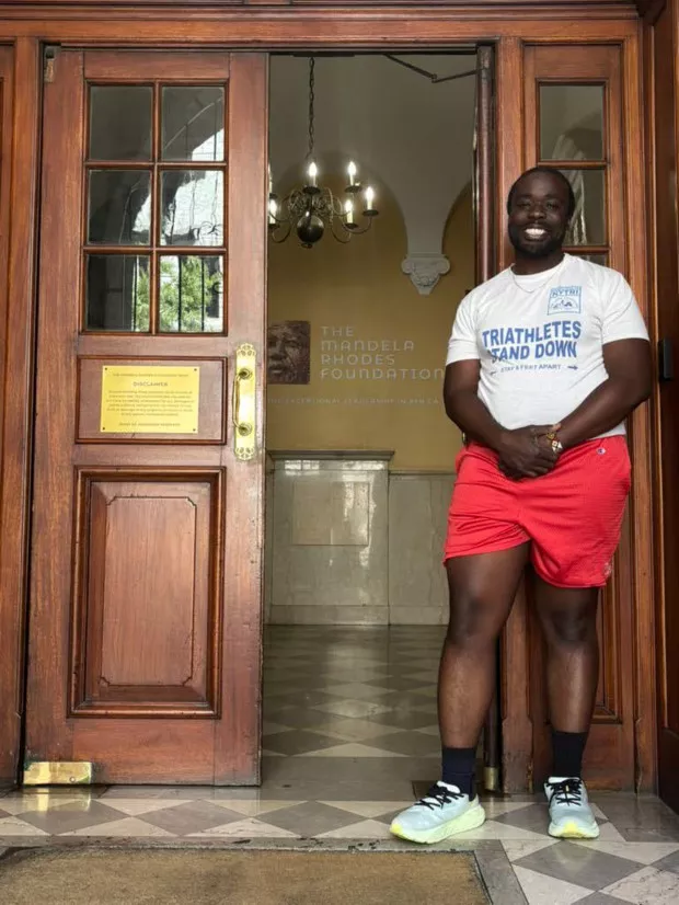 Ronlad in the doorway of the Mandela Rhodes Foundation