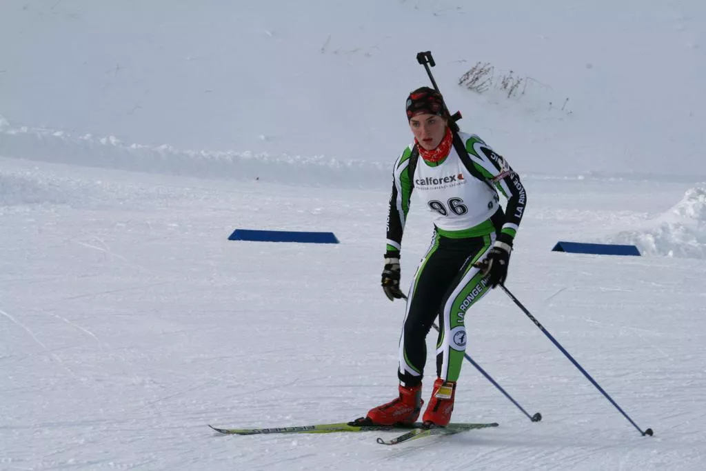 Natasha competes in the skiing portion of a biathlon in 2010.