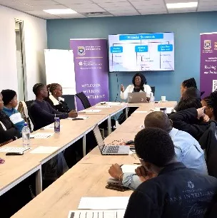 Dr. Jocelyn Evans conducting finance and accounting training