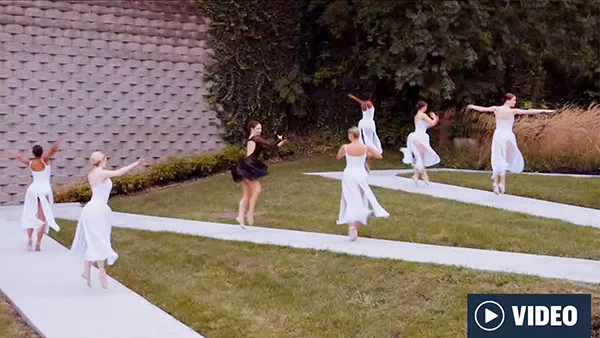 ballet dancers on sidewalk