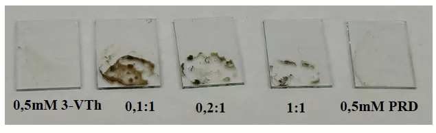 Several pieces of paper with stains.
