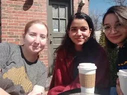 Group shot of 3 individuals at the scholar visit