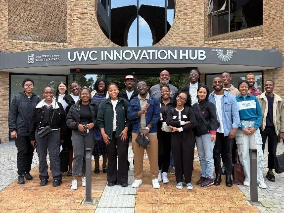 Marvin Carolina, Jr. and Dr Jocelyn Evans meeting with entrepreneurs